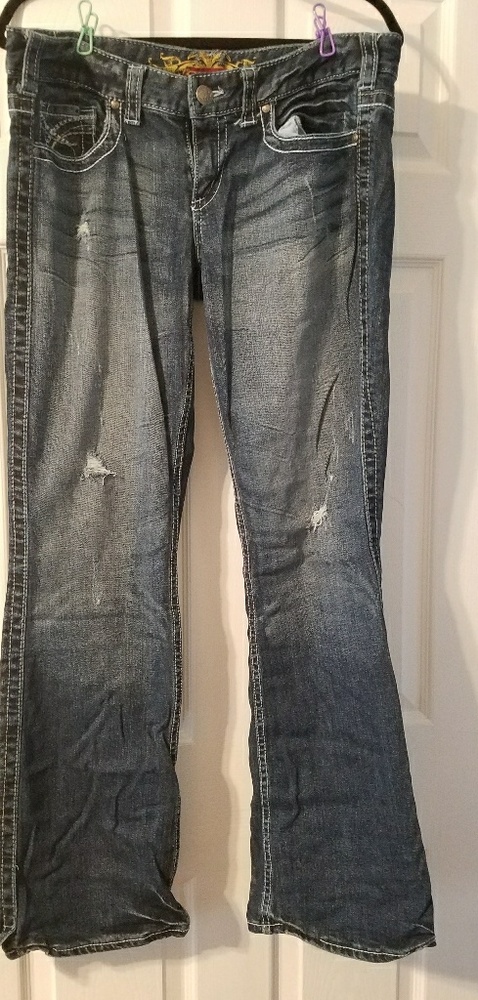 Maurices boot cut distressed jeans.